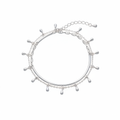 Dubbele zilveren armband witte achtergrond